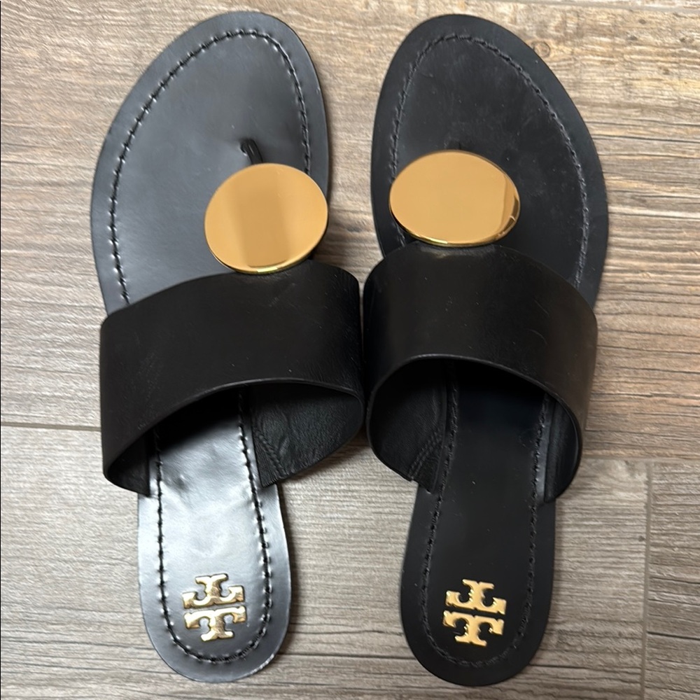 Tory Burch Black and Gold Sandals with Medallion Accent